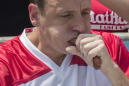 Defending champ Joey Chestnut sets record with 74 hot dogs