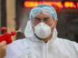 China's Communist Party is purging local officials as public anger mounts at coronavirus epidemic that has killed more than 1,000
