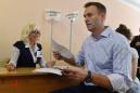 Russia targets opposition leader Navalny with mass raids