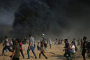 Israeli troops kill Palestinian at Gaza border protest, ceasefire efforts continue