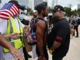 A Black Lives Matter organizer is facing felony charges for allegedly stealing flags during a pro-Trump caravan, reports say