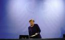 Merkel urges caution as Germany eases more virus curbs