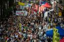 Thousands march in Hong Kong as restrictions grow