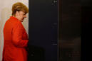 Merkel wins fourth term as far-right enters German parliament