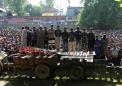 Civilian killed at funeral for slain Kashmir rebels: police