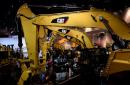 Caterpillar reports 54% drop in quarterly earnings