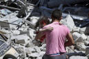 Syria keeps up deadly bombardment of rebel-held town