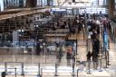 Officials: TSA agent tricked traveler into baring herself