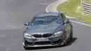 Possible BMW M4 CSL Spied In Action On Track And During Refueling