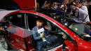 Tesla begins sales of cheaper Model 3 car variant in China
