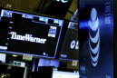 The Latest: AT&T, Time Warner complete major merger