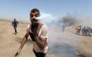 Palestinian protester hit in face by tear gas canister fired by Israeli soldier in Gaza protests