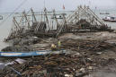 The Latest: Tsunami toll now 429 dead, thousands homeless