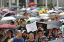 The Latest: Hong Kong police fire tear gas at protesters