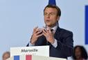 Macron throws electoral net wide, meeting Sarkozy's man in the south