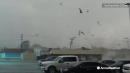 Insane video of tornado ripping buildings and powerlines apart