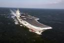 Xi makes surprise visit to fleet in South China Sea drill