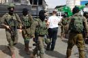 Palestinian kills two Israelis in West Bank shooting: army