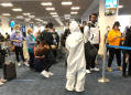 New York mother says flight from Miami was packed with people not wearing masks