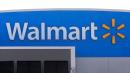 Walmart reinstates lapsed COVID-19 precautions as US cases surge