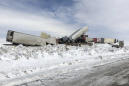 Snowy Wyoming highway pileup kills 3, injures dozens