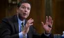 James Comey defends Clinton email decision but warns of threat from Russia