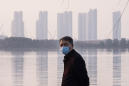 China flying home residents of virus-afflicted region
