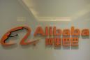 Alibaba profit up 37% but revenue growth eases