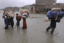 Death toll from flooding in northwest Pakistan rises to 48