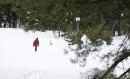 The Latest: California snowpack nearing record depths