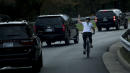Woman Fired After Flipping Off Trump's Motorcade Sues Former Employer