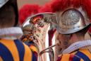 Swiss guards, loyal soldiers of the pope, take the oath