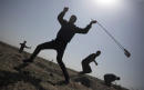 Israel says it will expand response if Gaza clashes go on