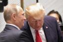 Vladimir Putin says 'absurd' election meddling claims are designed to hurt Donald Trump