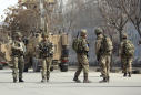 Officials say gunmen kill 32 at ceremony in Afghan capital