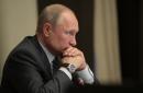 Putin steps up drive for clout in Africa with broadside against West