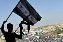 Defying dangers, Idlib residents protest Syria's Assad