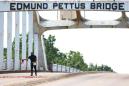 John Lewis: Body of civil rights leader carried across Selma bridge on his final journey