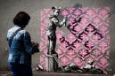 Banksy needles France with migrant mural blitz in Paris