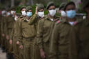 Israel marks memorial day under tightened virus restrictions