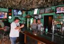 As many evacuate for Dorian, a 'hurricane bar' caters to those who stay