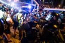 Hong Kong Police Officer Slashed in Neck as Violence Continues