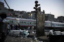 Egypt arrests train conductor after youth jumps to his death