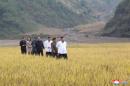 North Korea's Kim tours flood-hit town, sister reappears in public