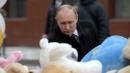 Vladimir Putin faces rare public protests as he blames 'criminal negligence' for deadly mall fire