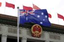 Australia says security agencies acted on evidence in Chinese journalist raid