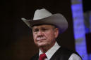 Bible-thumping, pistol-packing Roy Moore is not Trump's candidate in Ala. Senate race. He's leading anyway.