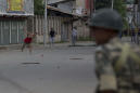 Hundreds defy restrictions, join protests in Kashmir