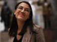 Trump retweets attack on AOC calling her an 'embarrassing, barely literate moron'