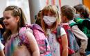 German schools forced to close after teacher and pupil test positive for virus